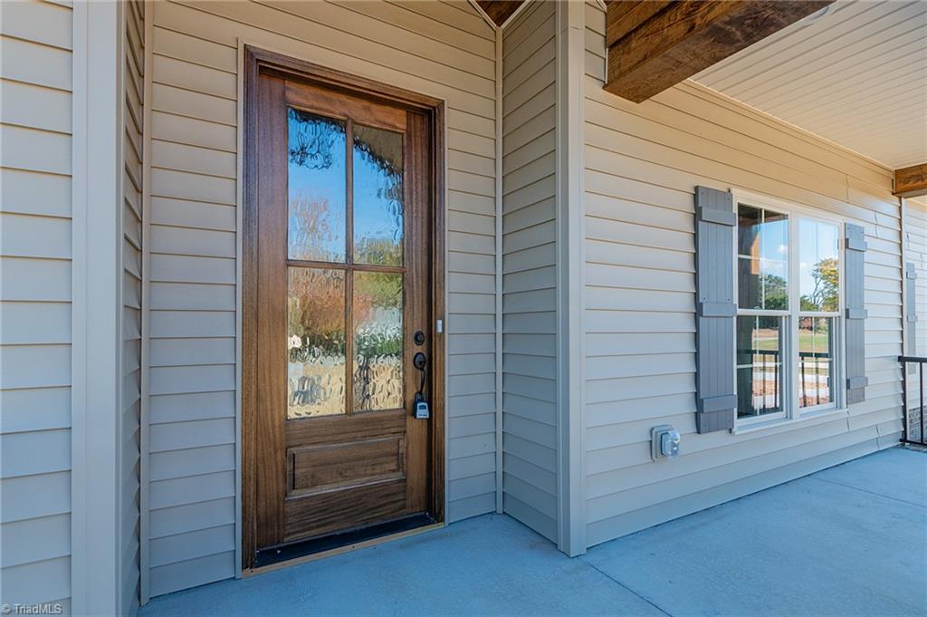 8448 Fairgrove Church Road Browns Summit, NC 27214 - Photo 3 of 48 Front Porch Entry