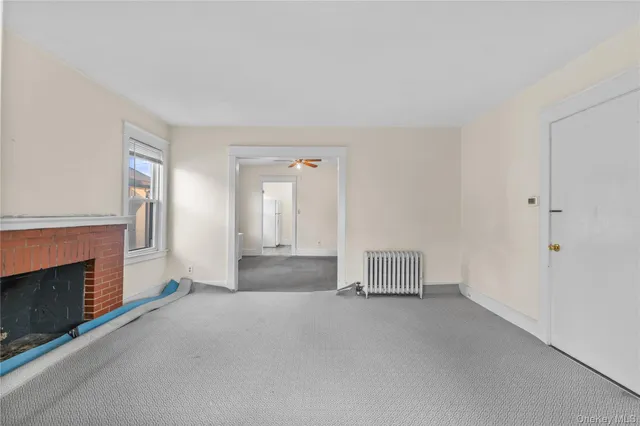 a view of a hallway with closet