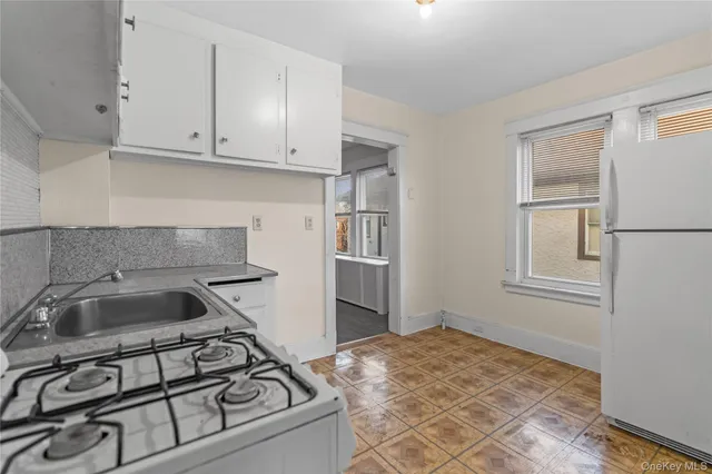 a view of a room with a large window