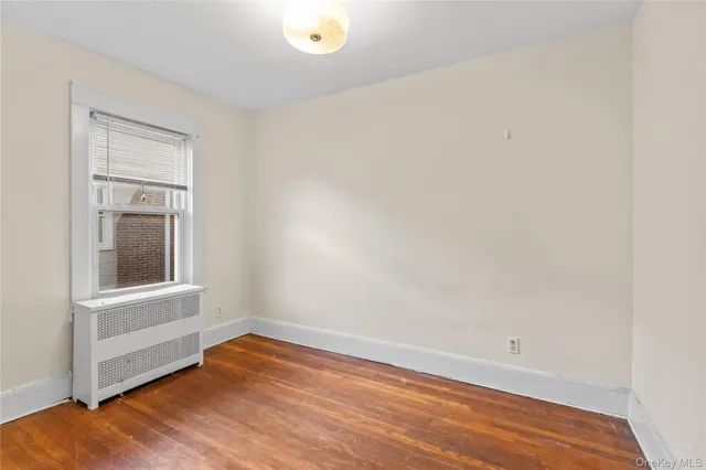 a bathroom with a granite countertop bathtub sink and toilet