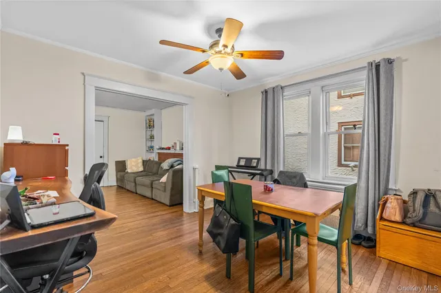 a workspace with furniture and wooden floor