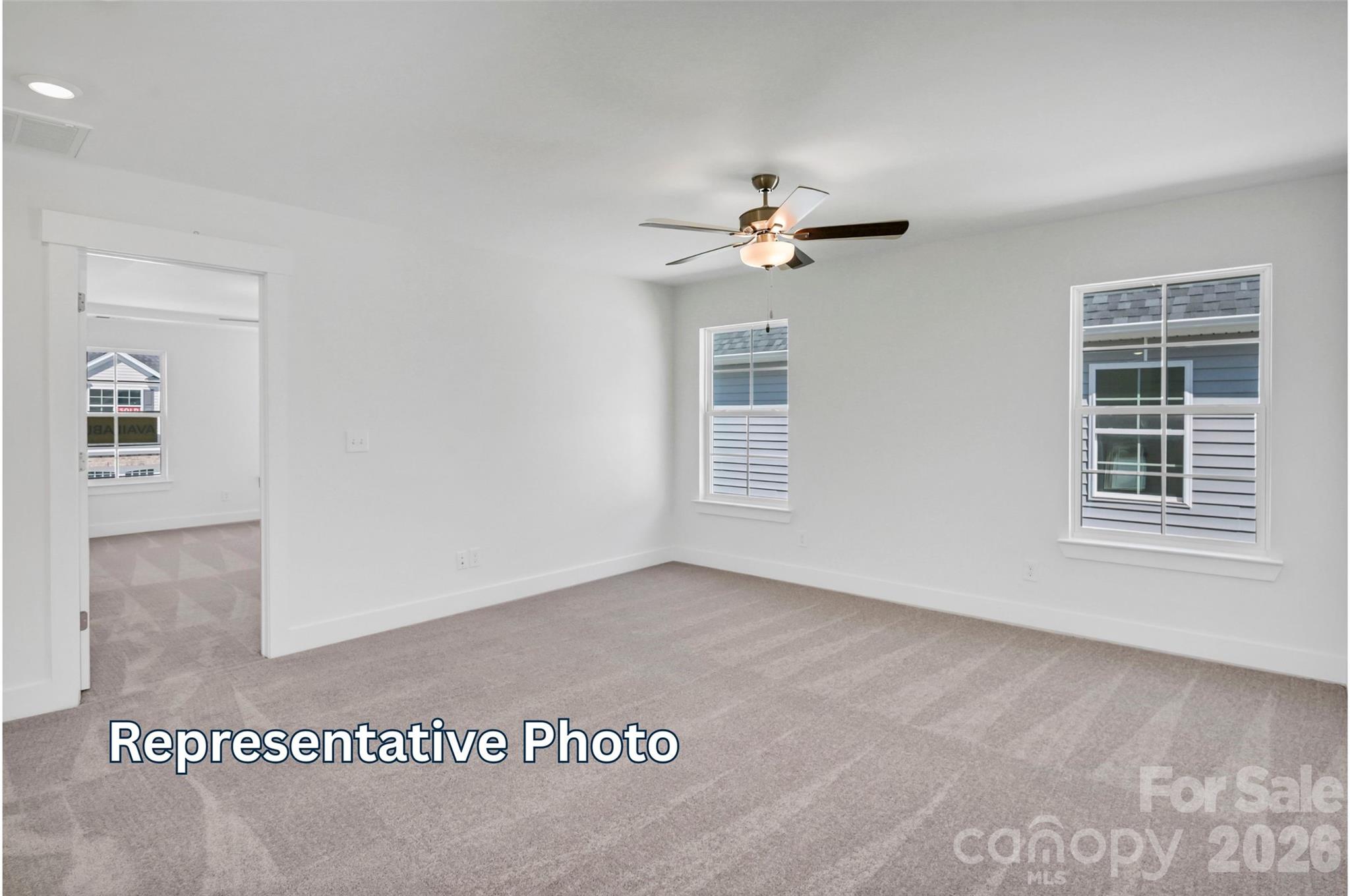 13115 Foxberry Road Charlotte, NC 28213 - Photo 18 of 20 a view of an empty room with a window