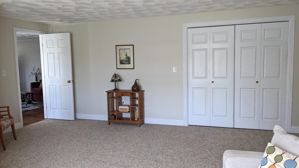 53 Baldwin Road, Unit 201 Billerica, MA 01821 - Photo 26 of 35 a view of an empty room with closet and a window