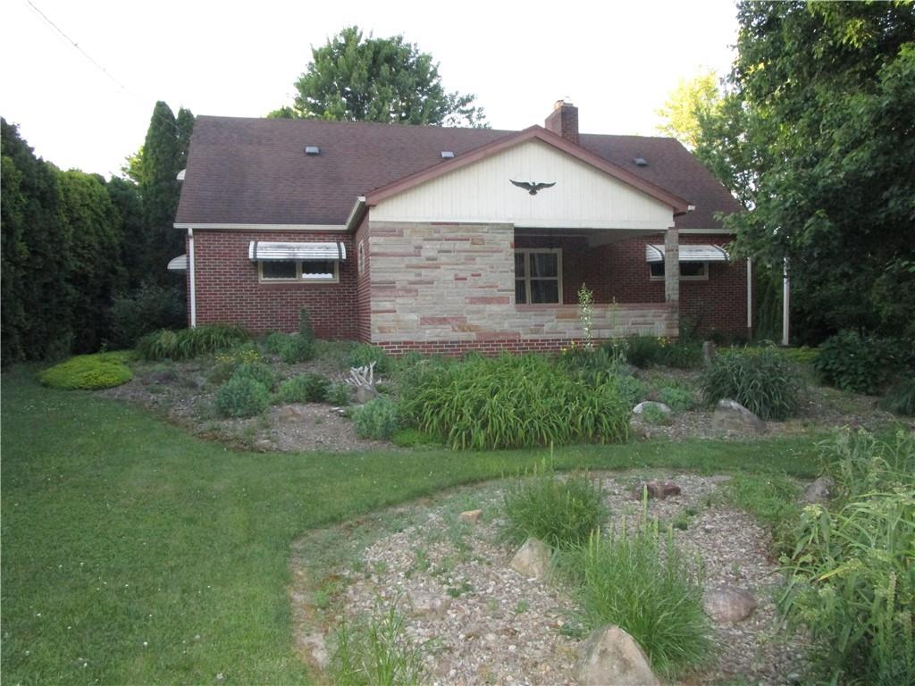 3330 Hubbard-Middlesex Road West Middlesex, PA 16159 - Photo 1 of 21 a front view of a house with a yard