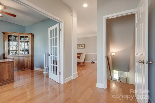 a view of a bedroom from a hallway