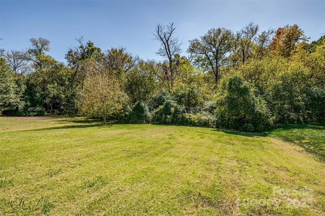 a view of a yard with an outdoor space