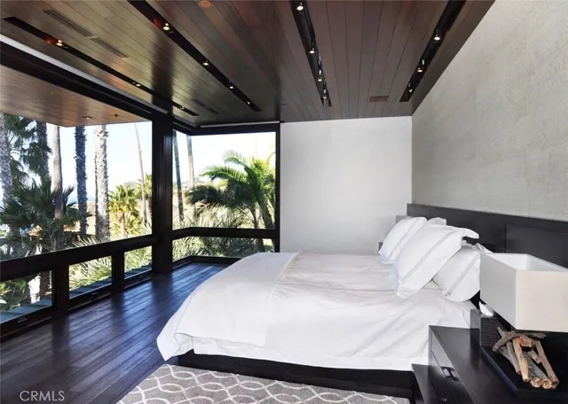 a bedroom with a bed and a closet