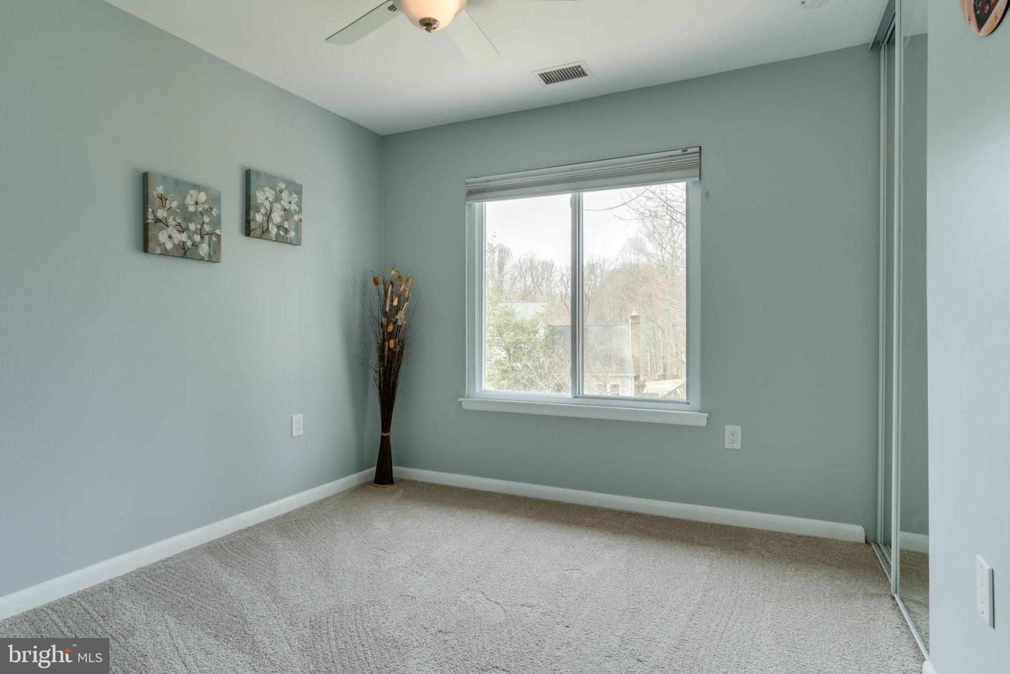 7627 Mineral Spring Court Springfield, VA 22153 - Photo 9 of 34 a view of an empty room with a window