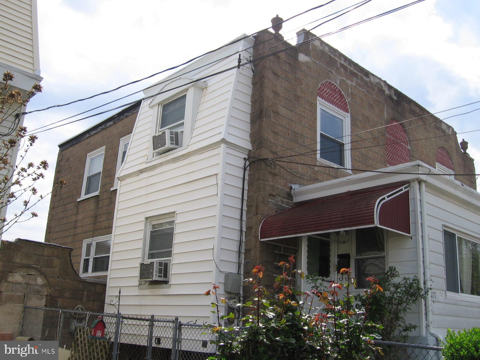 177 Wellington Road Upper Darby, PA 19082 - Photo 3 of 20 a view of a house with a plants on top of house