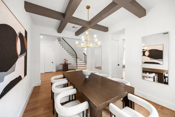 a kitchen with stainless steel appliances a sink stove and refrigerator