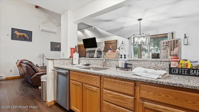 a kitchen with granite countertop lots of counter top space