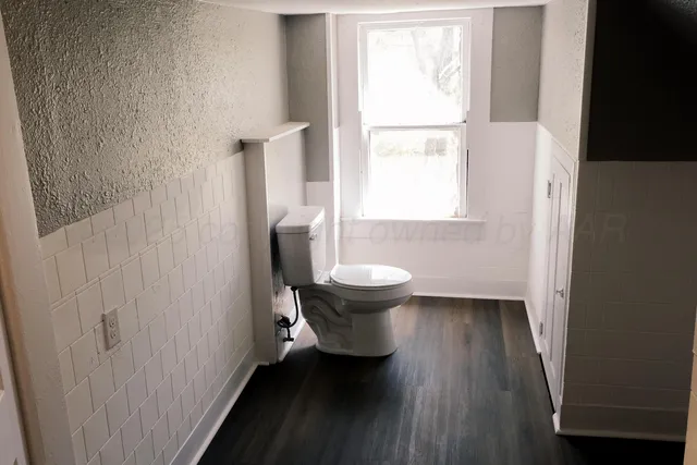 a bathroom with a sink and a toilet