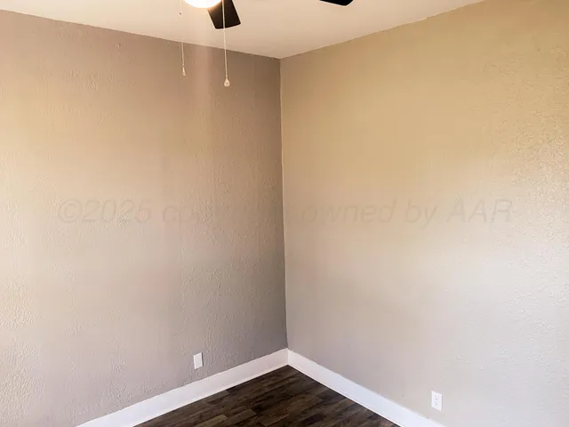 a view of small space with wooden floor