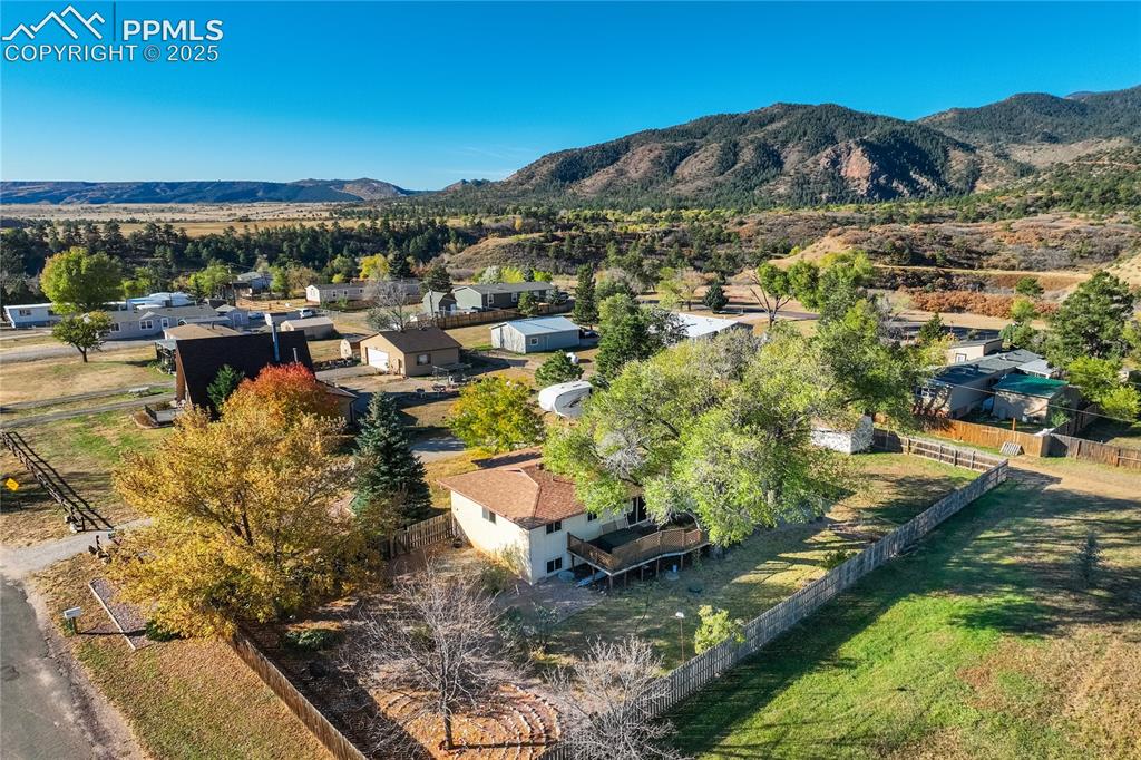 8340 Piute Road Colorado Springs, CO 80926 - Photo 48 of 48 Aerial perspective of suburban area featuring mountains