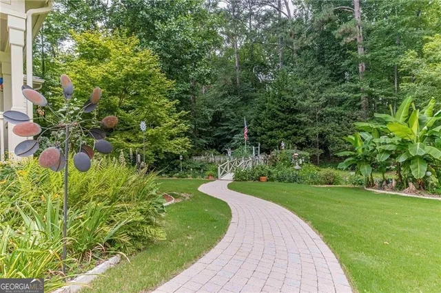 a view of a garden with a pathway