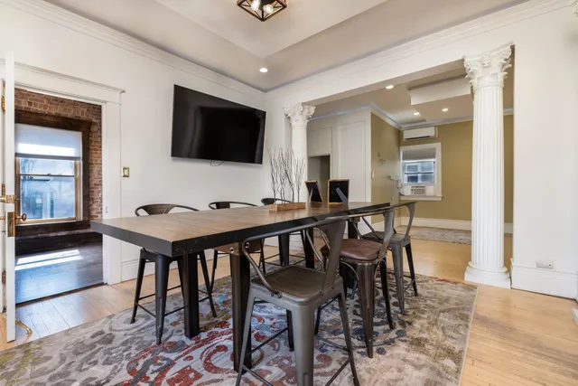 a view of a dining room with furniture