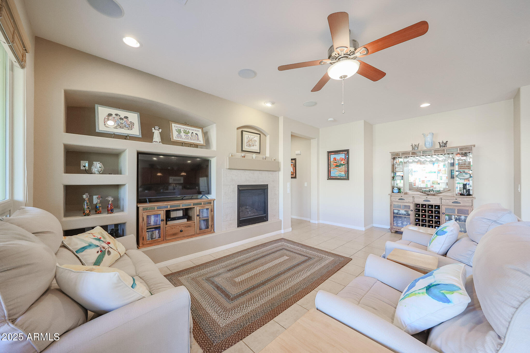 17574 West Nighthawk Way Goodyear, AZ 85338 - Photo 14 of 58 Great Room with Built-Ins
