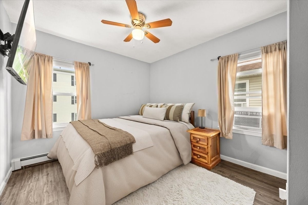 35 Hazel Street, Unit B Attleboro, MA 02703 - Photo 10 of 21 a bedroom with a bed and a window