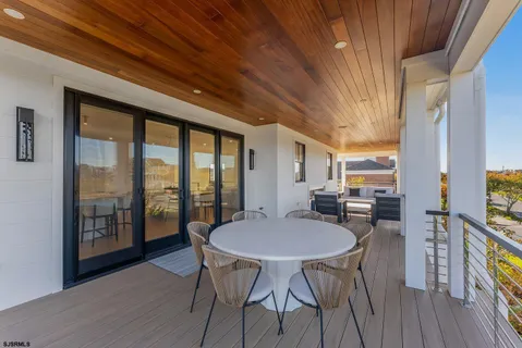 a bathroom with a double vanity sink mirror and shower