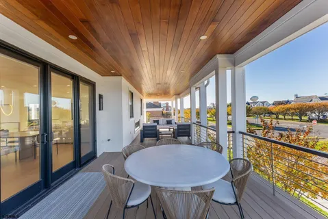 a bathroom with a double vanity sink a mirror and a shower