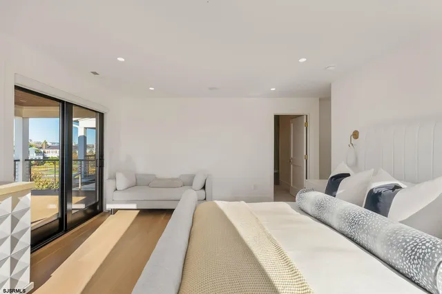 a view of a balcony with wooden floor