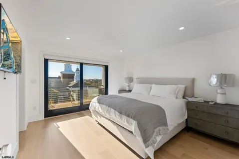 a open kitchen with stainless steel appliances granite countertop a stove refrigerator sink and cabinets