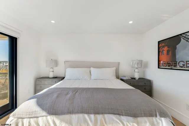 a view of a patio with a table and chairs
