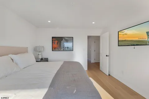 a view of a house with swimming pool in front of it