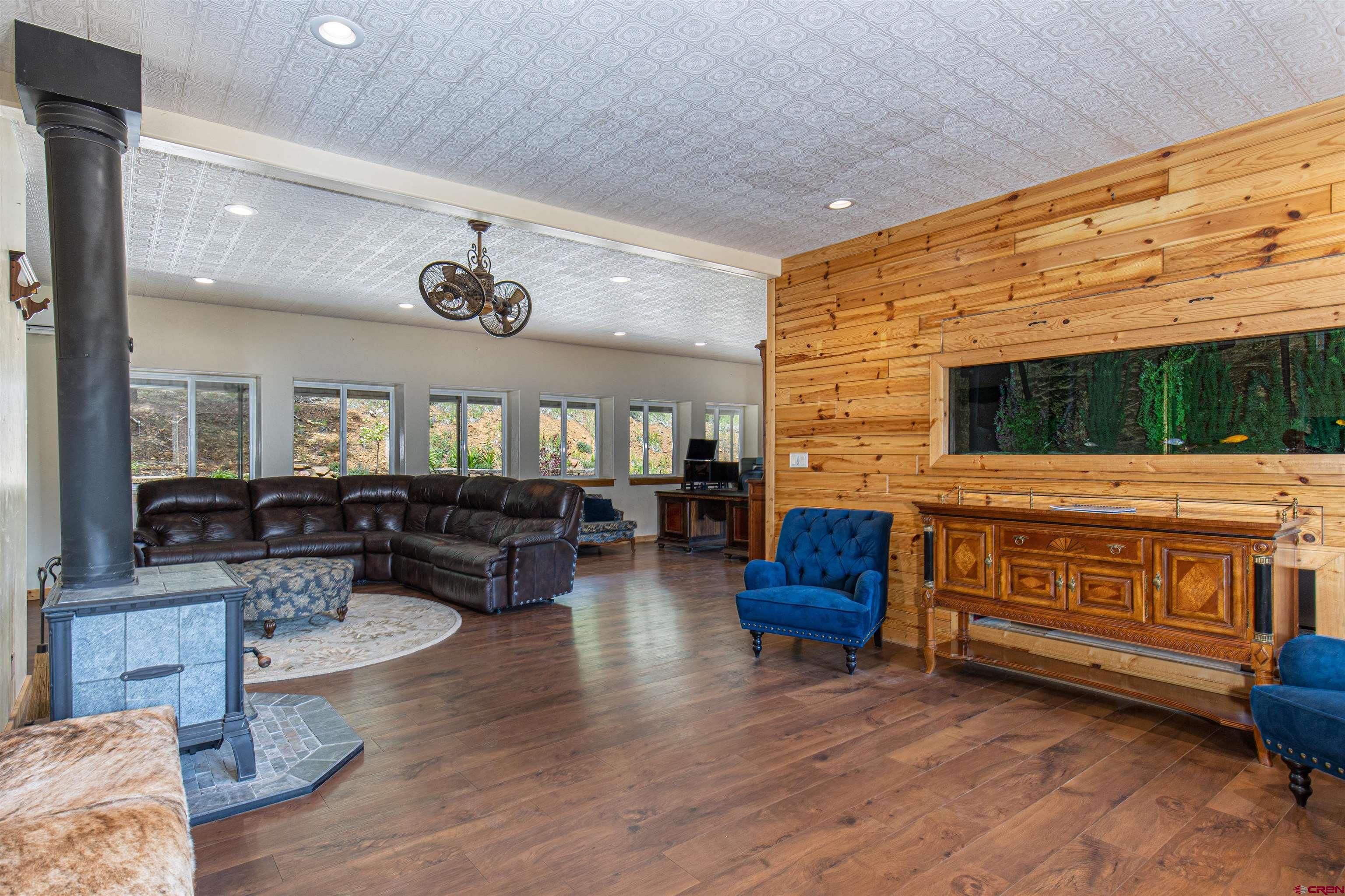 7049 County Road 105 Hesperus, CO 81326 - Photo 13 of 23 a living room with furniture and a flat screen tv