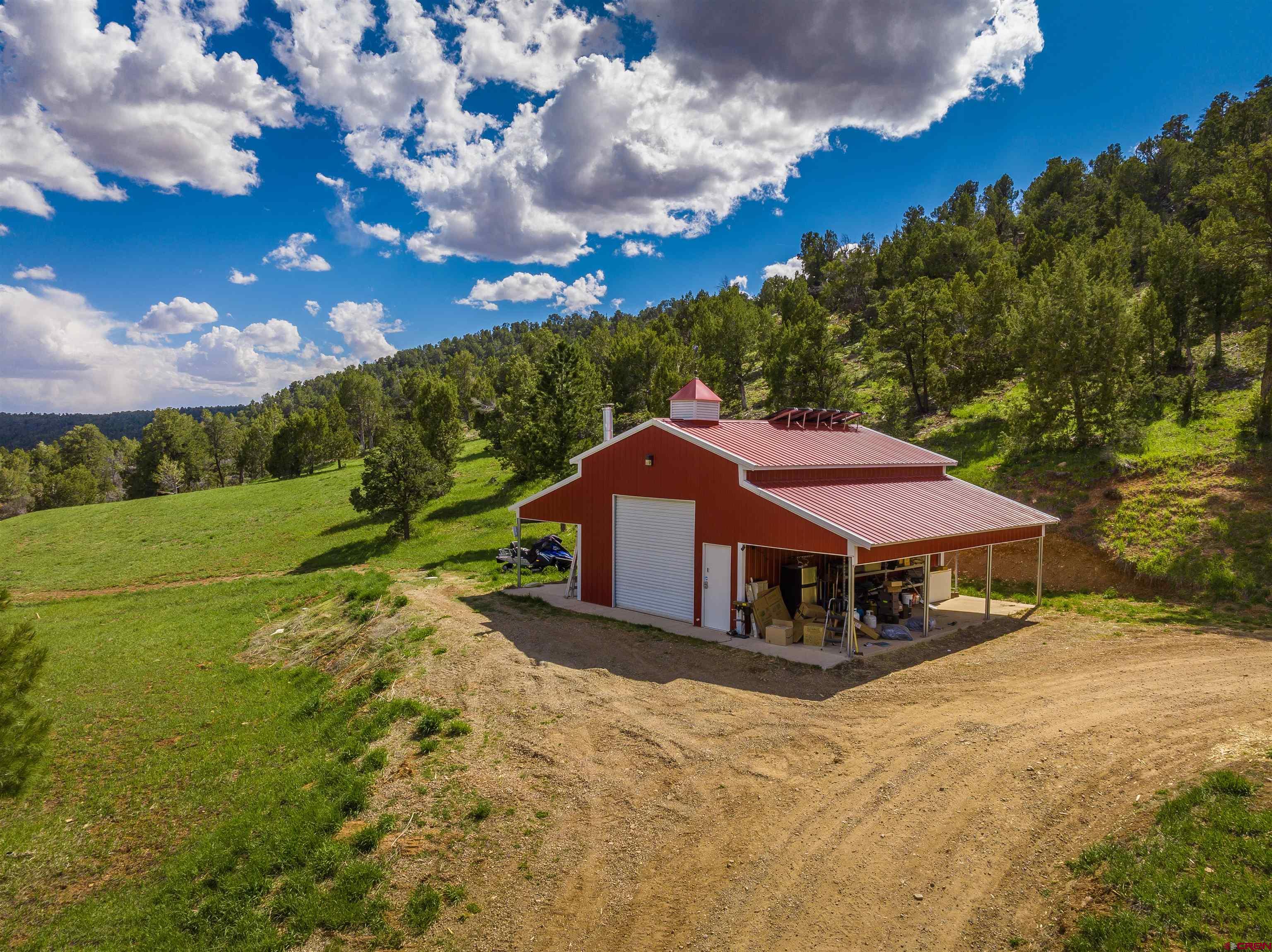 7049 County Road 105 Hesperus, CO 81326 - Photo 2 of 23 a view of a house with a big yard