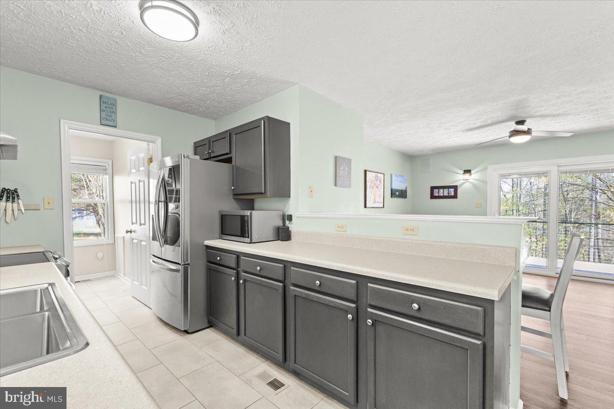 290 Dodee Lane Union Hall, VA 24176 - Photo 12 of 64 a kitchen with a sink appliances and cabinets