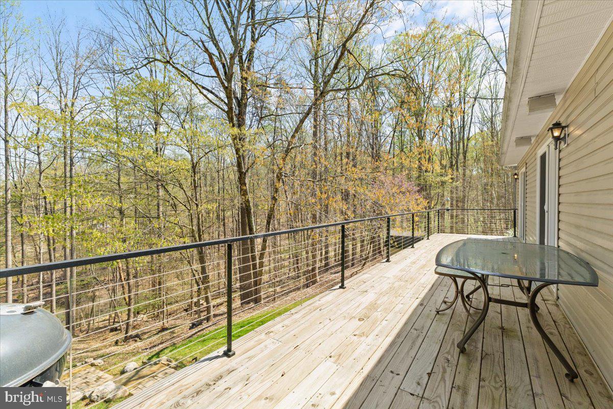 290 Dodee Lane Union Hall, VA 24176 - Photo 21 of 64 a view of balcony with furniture and wooden floor