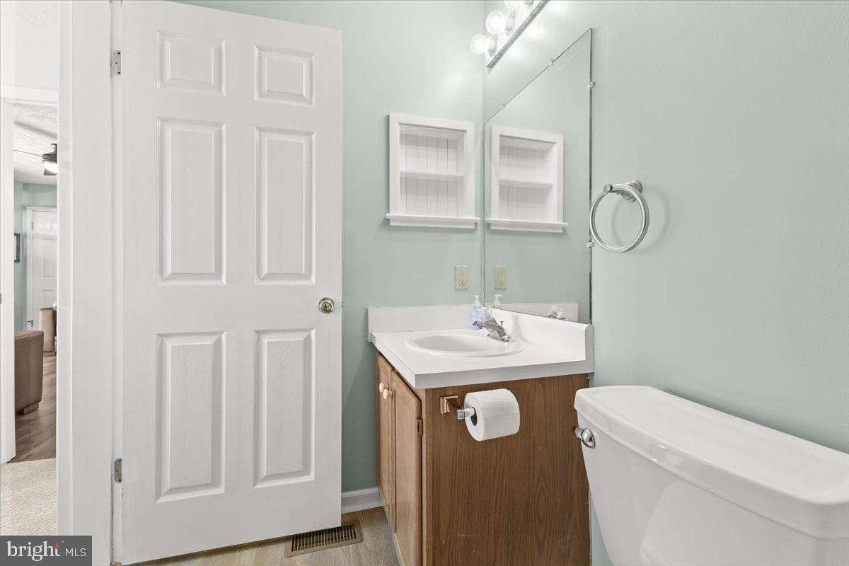 290 Dodee Lane Union Hall, VA 24176 - Photo 23 of 64 a bathroom with a sink toilet and vanity