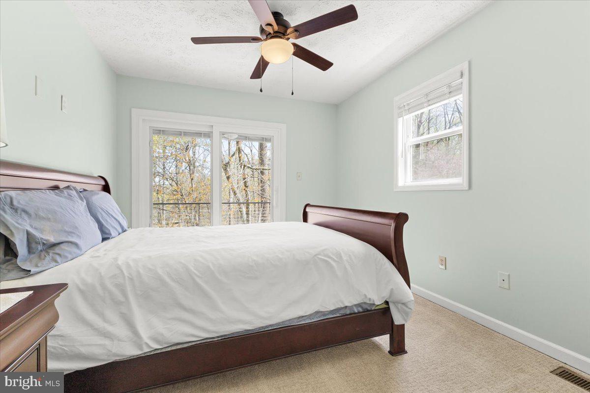 290 Dodee Lane Union Hall, VA 24176 - Photo 24 of 64 a bedroom with a bed and a window