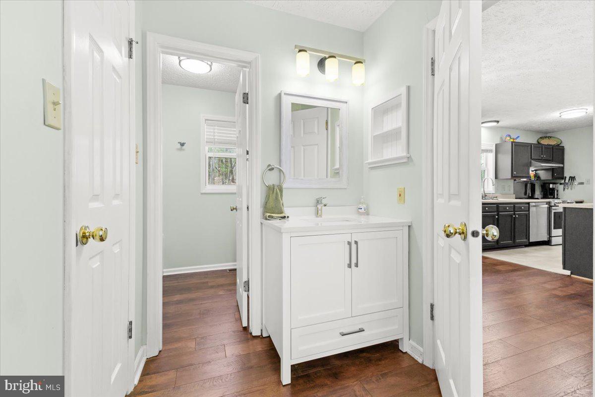 290 Dodee Lane Union Hall, VA 24176 - Photo 28 of 64 a bathroom with a sink vanity and mirror