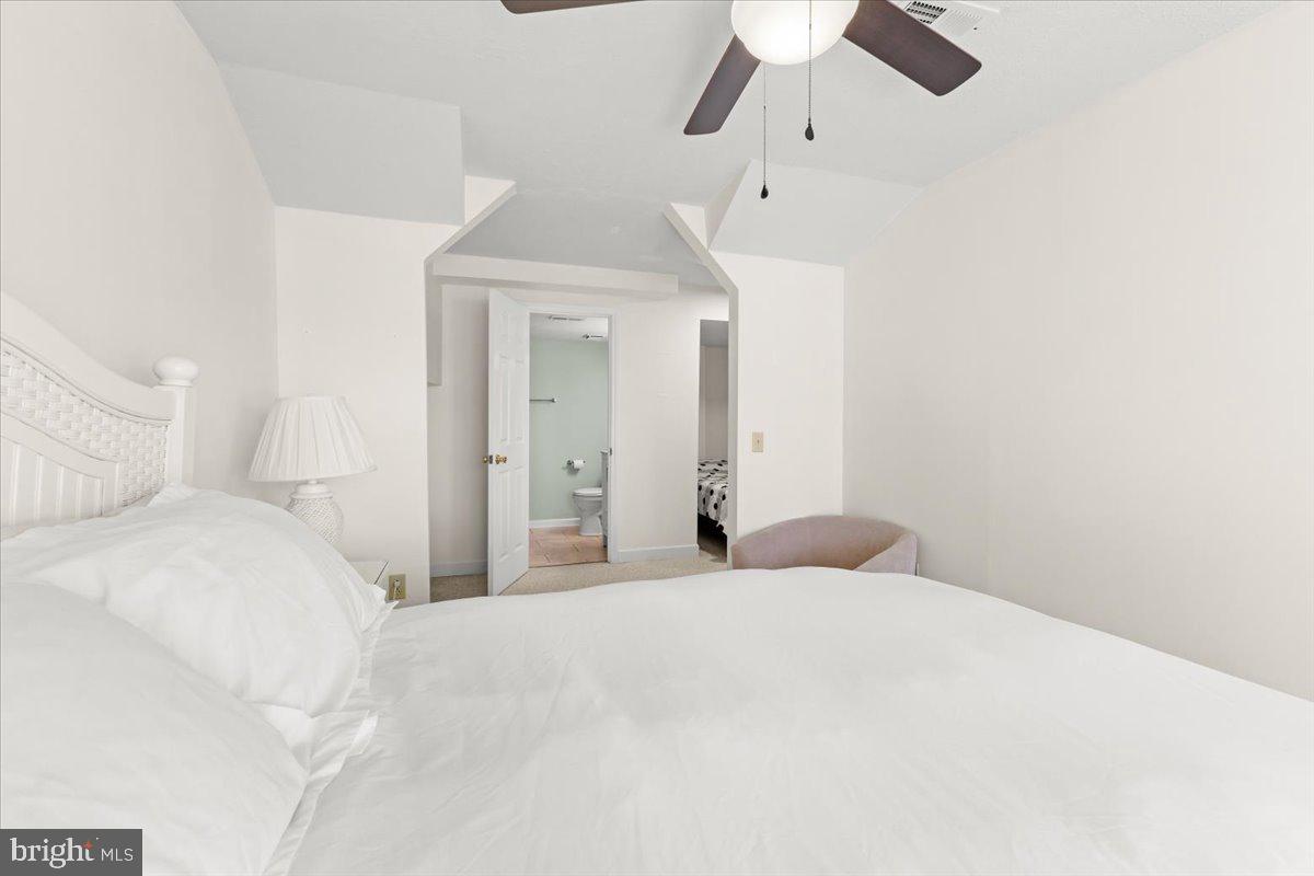 290 Dodee Lane Union Hall, VA 24176 - Photo 33 of 64 a bedroom with a bed and a chandelier