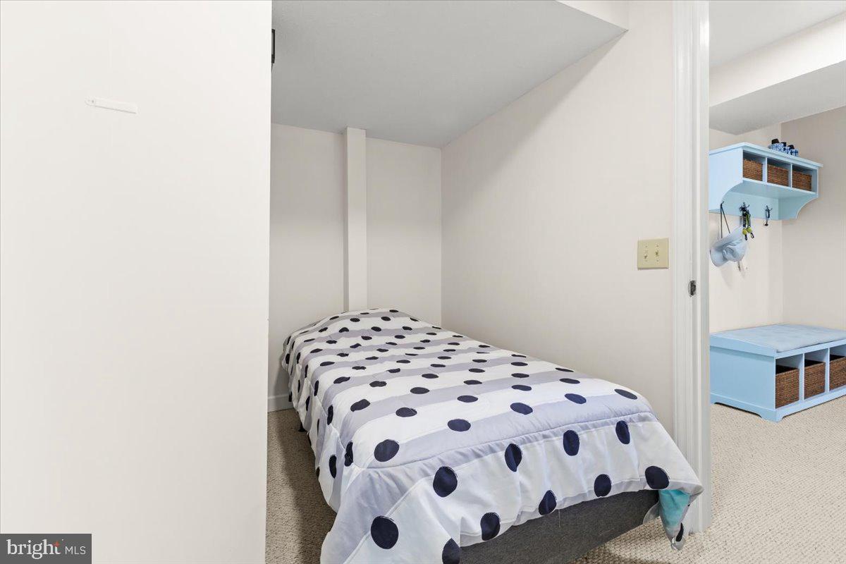 290 Dodee Lane Union Hall, VA 24176 - Photo 34 of 64 a bedroom with a bed and a wooden floor