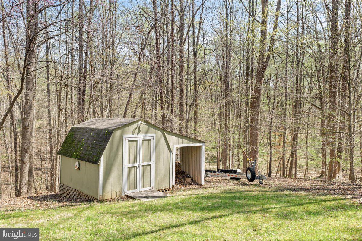 290 Dodee Lane Union Hall, VA 24176 - Photo 47 of 64 a white house with a big yard and large trees