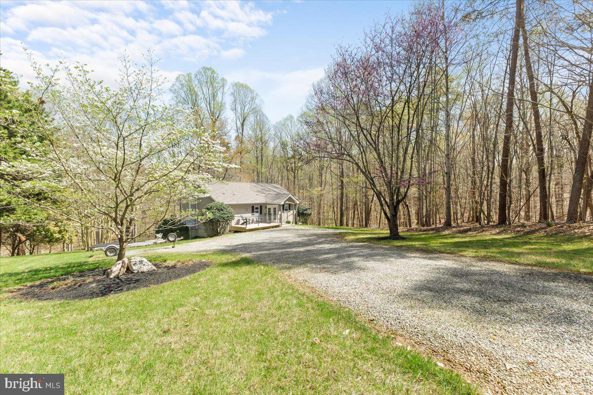 290 Dodee Lane Union Hall, VA 24176 - Photo 5 of 64 a front view of a house with a yard and garage