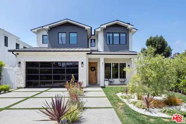 a house view with a garden space