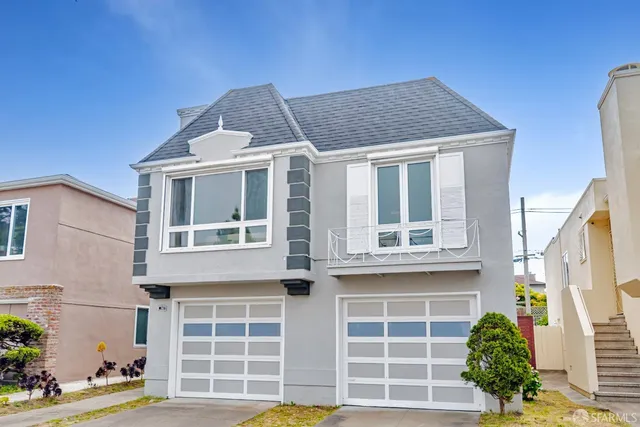 a view of a cafe with sitting area