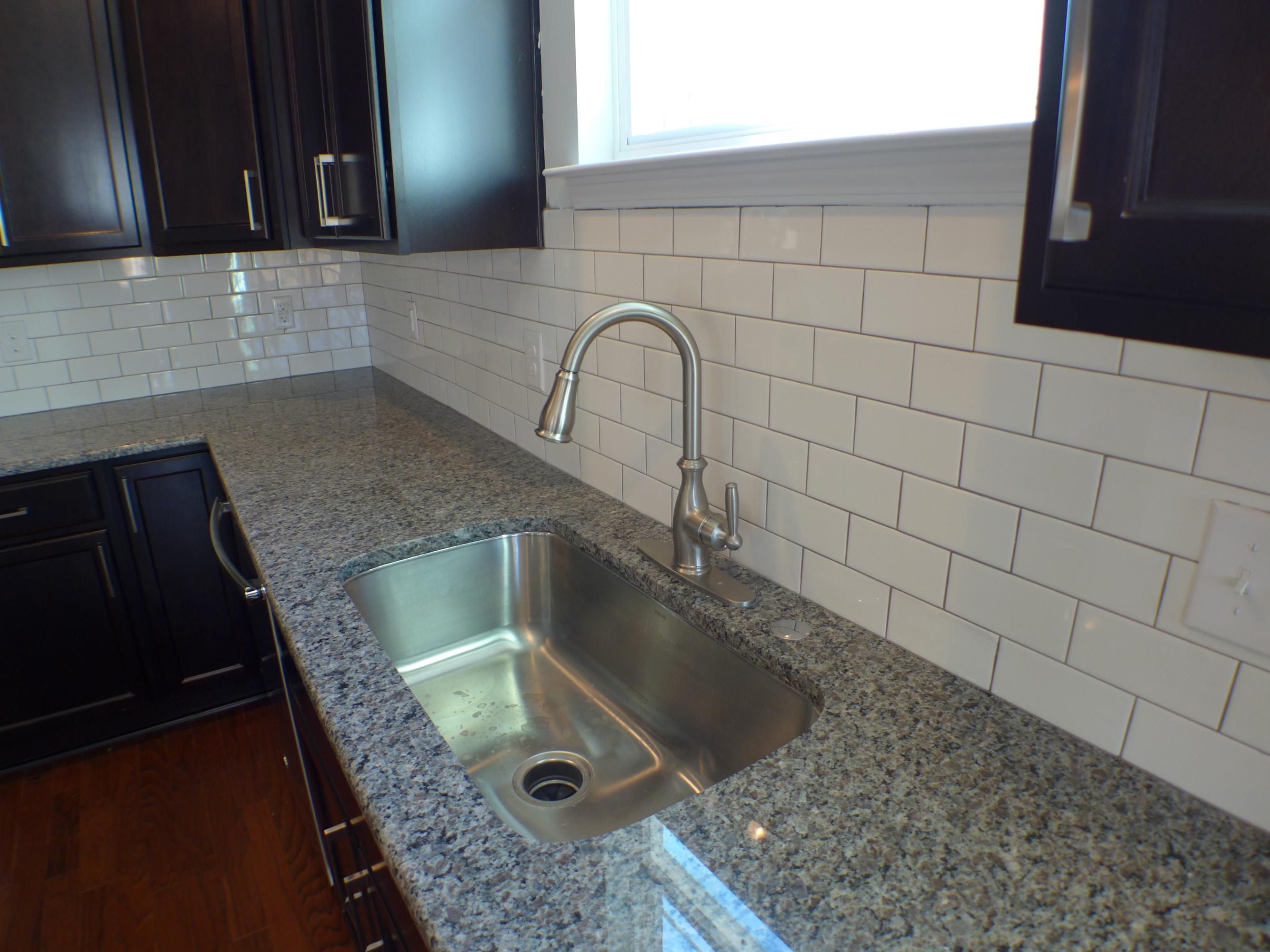 156 Hickory Ridge Way Summerville, SC 29483 - Photo 12 of 42 sink and subway tile backsplash.