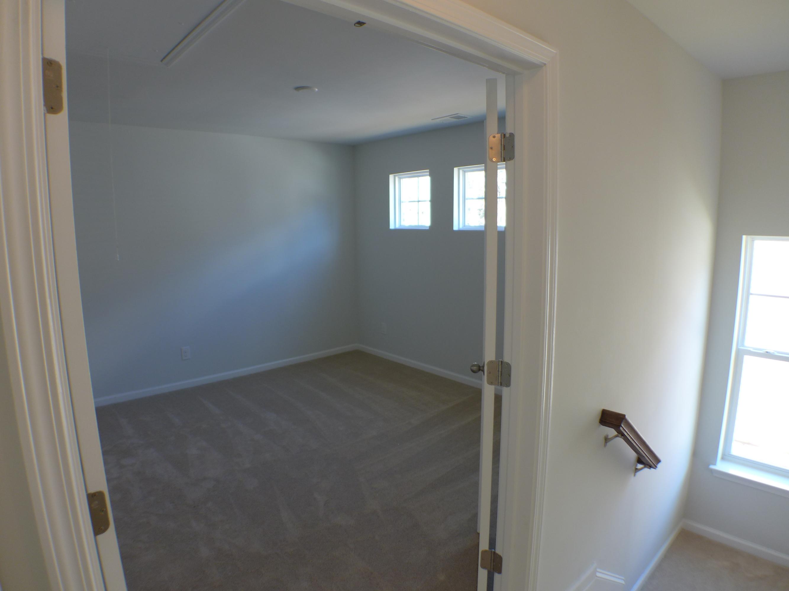 156 Hickory Ridge Way Summerville, SC 29483 - Photo 20 of 42 Double doors into master sitting room.