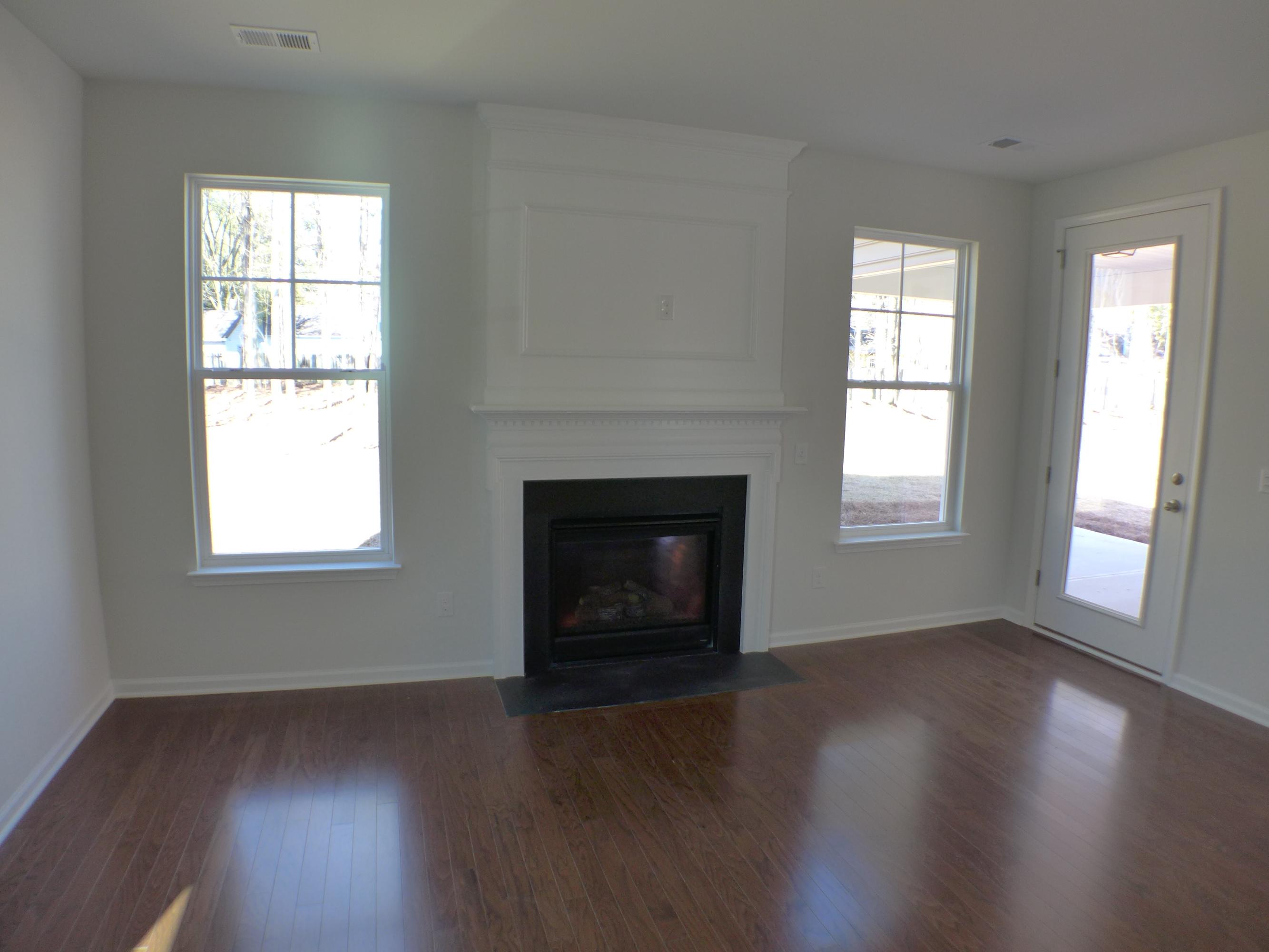 156 Hickory Ridge Way Summerville, SC 29483 - Photo 8 of 42 Great room with gas log fireplace.