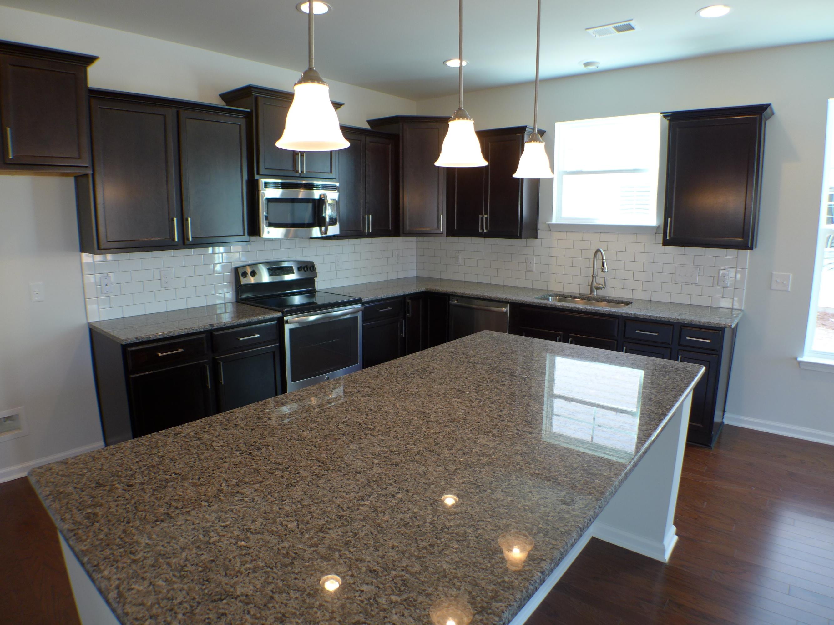 156 Hickory Ridge Way Summerville, SC 29483 - Photo 10 of 42 Kitchen island.