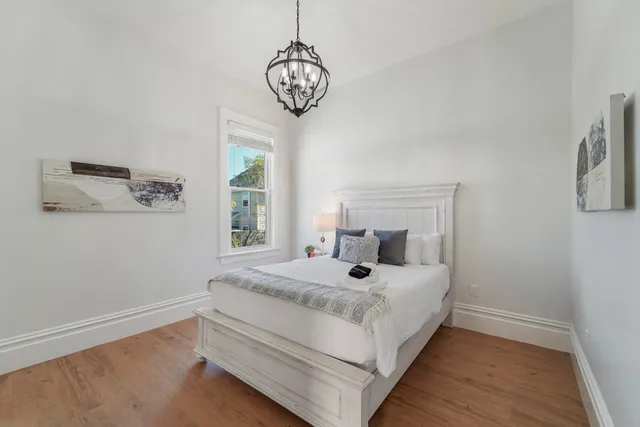 a bathroom with a glass shower door and a toilet