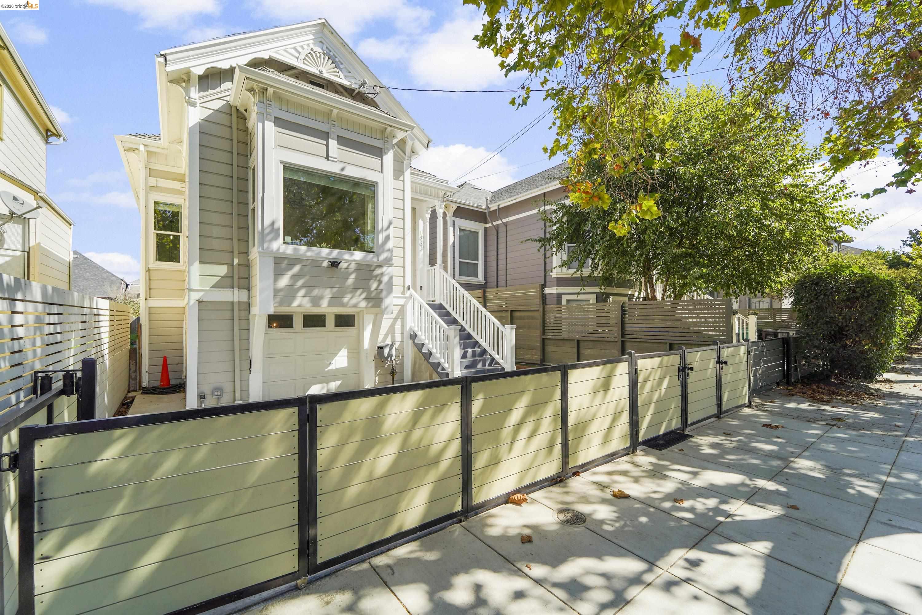 1662 14th Street Oakland, CA 94607 - Photo 2 of 57 a view of a brick house with a large windows