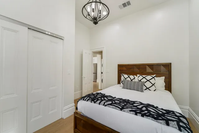 a bathroom with a sink toilet and mirror