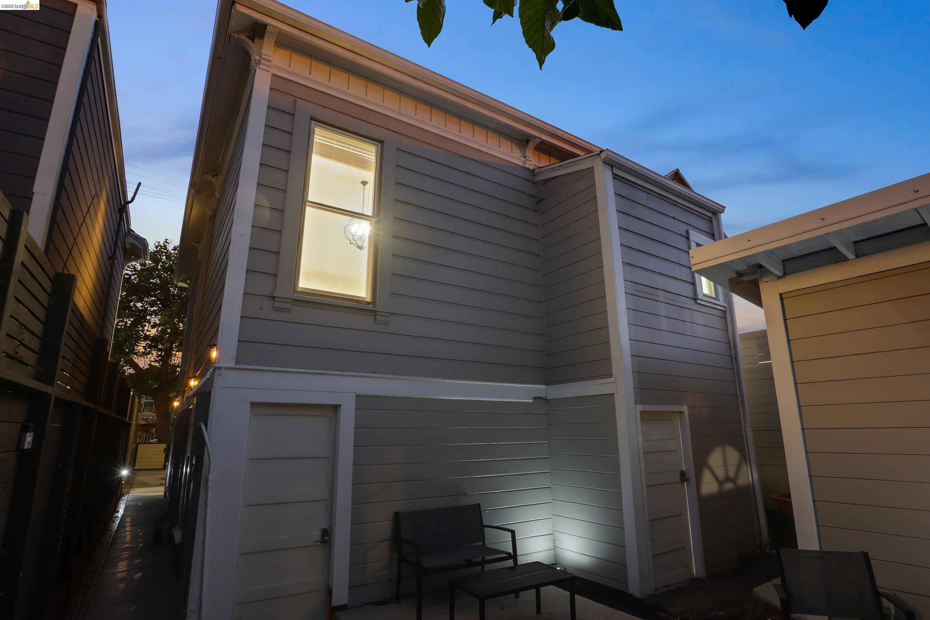 1662 14th Street Oakland, CA 94607 - Photo 56 of 57 a front view of a house with a yard