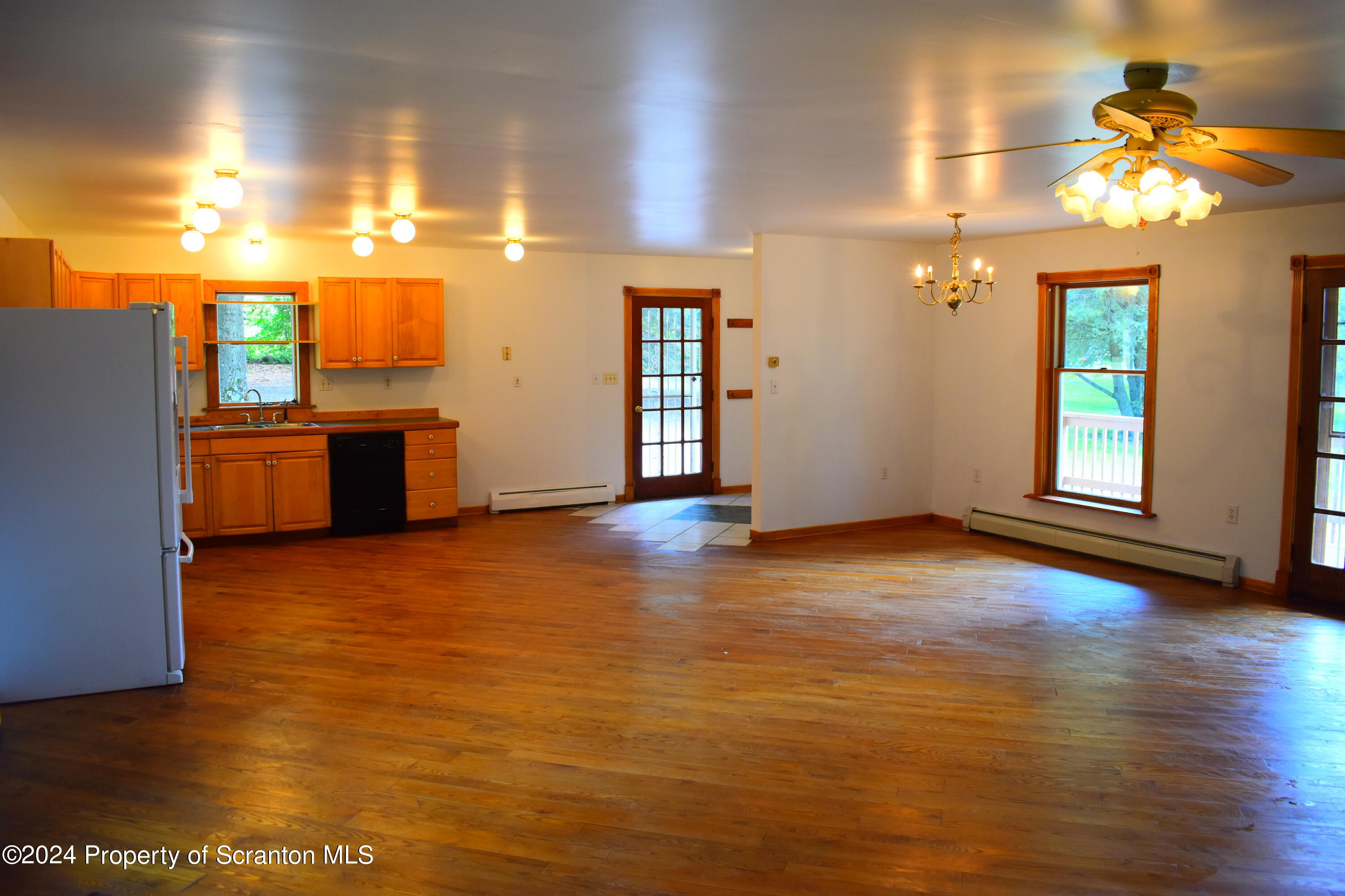 7678 State Rte 3023 Montrose, PA 18801 - Photo 6 of 29 a view of a livingroom with a kitchen and a window